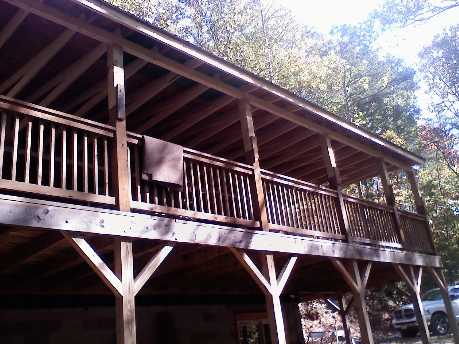 Timber framing under a new elevated porch and deck — Roof Leak Repair in Lindsey by Roofing Brothers